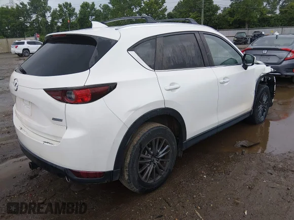 ✅ 2019 Mazda CX-5 Touring • VIN: JM3KFBCM4K0649571 • Lot: 45491818. Wystawiony na IAAI z przebiegiem 81 542 mil. Bezpłatny archiwum sprzedaży aukcyjnych z USA i szczegółowy raport historii pojazdu na DreamBid. Zdjęcie 4.