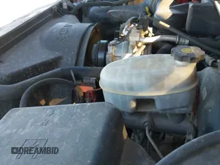 2004 Chevrolet Silverado 1500 Work Truck z VIN 1GCEC14X34Z152656, wystawiony jako IAAI lot #41308111 z przebiegiem Nie podano mil oraz . Historia ofert i sprzedaży dostępna na DreamBid. Obrazek 18.