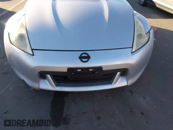 ✅ 2012 Nissan 370Z Touring • VIN: JN1AZ4FH7CM371266 • Lot: 44191564. Wystawiony na IAAI z przebiegiem 125 769 mil. Bezpłatny archiwum sprzedaży aukcyjnych z USA i szczegółowy raport historii pojazdu na DreamBid. Zdjęcie 6.