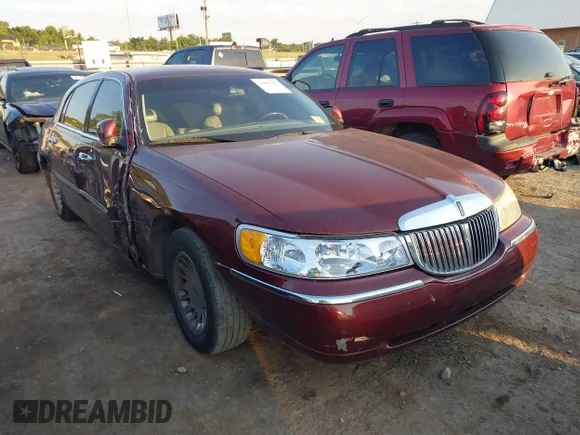 ✅ 2002 Lincoln Town Car Cartier • VIN: 1LNHM83WX2Y626905 • Лот: 42866198. Опубликован ранее на IAAI с пробегом 50 736 миль. Бесплатный доступ к архиву аукционных продаж из США и подробный отчёт об истории автомобиля на DreamBid. Изображение 1.