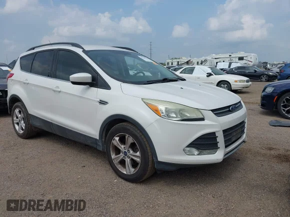 ✅ 2016 Ford Escape SE • VIN: 1FMCU0GX7GUB58810 • Lot: 45198510. Listed on IAAI with 109,588 mi. Free auction sales archive from the USA and detailed vehicle history report at DreamBid. Image 1.