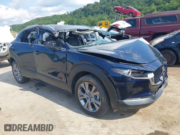 ✅ 2023 Mazda CX-30 S Preferred • VIN: 3MVDMBCM5PM556052 • Лот: 42976306. Опубліковано раніше на IAAI з пробігом 10 000 миль. Безкоштовний доступ до архіву аукціонних продажів зі США та докладний звіт про історію автомобіля на DreamBid. Зображення 1.