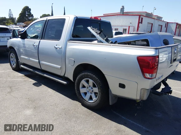 ✅ 2004 Nissan Titan XE • VIN: 1N6AA07AX4N570223 • Lot: 45326058. Listed on IAAI with 266,841 mi. Free auction sales archive from the USA and detailed vehicle history report at DreamBid. Image 3.