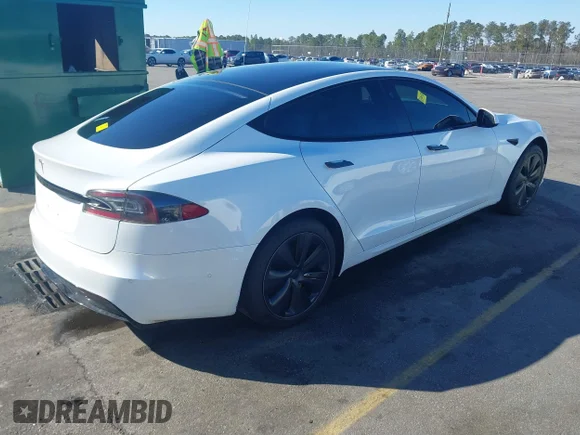 ✅ 2021 Tesla Model S Long Range • VIN: 5YJSA1E56MF453711 • Lot: 41467603. Listed on IAAI with 115,634 mi. Free auction sales archive from the USA and detailed vehicle history report at DreamBid. Image 4.