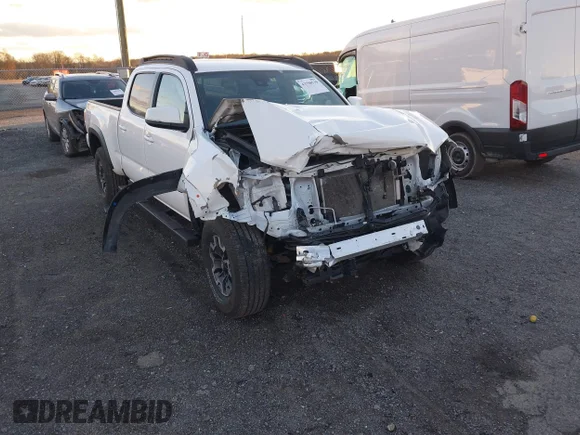 ✅ 2023 Toyota Tacoma TRD Sport • VIN: 3TMDZ5BN7PM159814 • Лот: 43798539. Опубликован ранее на IAAI с пробегом 52 298 миль. Бесплатный доступ к архиву аукционных продаж из США и подробный отчёт об истории автомобиля на DreamBid. Изображение 1.
