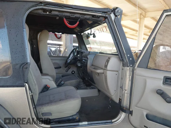 ✅ 2004 Jeep Wrangler Rubicon • VIN: 1J4FA69S34P790514 • Лот: 43955493. Опубліковано раніше на IAAI з пробігом 111 607 миль. Безкоштовний доступ до архіву аукціонних продажів зі США та докладний звіт про історію автомобіля на DreamBid. Зображення 5.