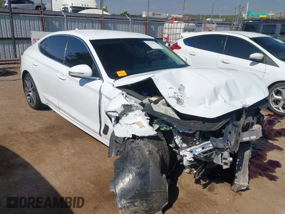 ✅ 2023 Genesis G70 3.3T • VIN: KMTG54TEXPU114140 • Lot: 43415651. Listed on IAAI with 50,426 mi. Free auction sales archive from the USA and detailed vehicle history report at DreamBid. Image 1.