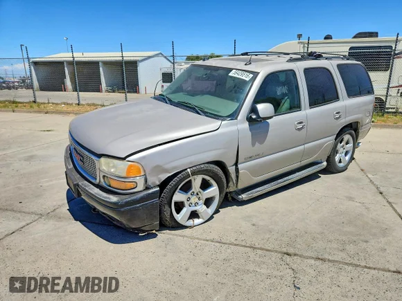 ✅ 2005 GMC Yukon Denali • VIN: 1GKEK63U45J212827 • Lot: 58409516. Listed on Copart with 164,361 mi. Free auction sales archive from the USA and detailed vehicle history report at DreamBid. Image 1.