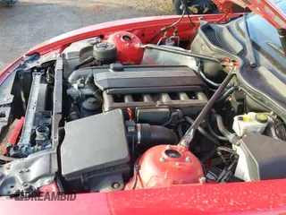 ✅ 2005 BMW Z4 2.5i • VIN: 4USBT33575LR69979 • Lot: 43471440. Listed on IAAI with 157,397 mi. Free auction sales archive from the USA and detailed vehicle history report at DreamBid. Image 21.