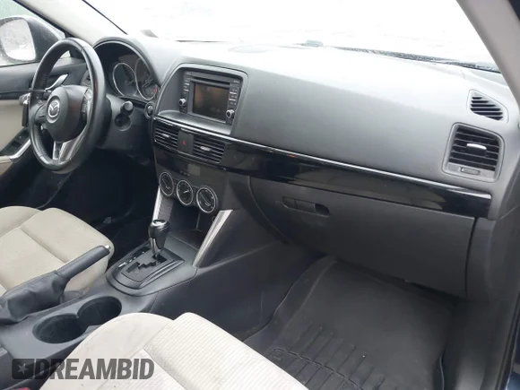 ✅ 2014 Mazda CX-5 Touring • VIN: JM3KE4CY7E0327772 • Lot: 44042881. Wystawiony na IAAI z przebiegiem 197 738 mil. Bezpłatny archiwum sprzedaży aukcyjnych z USA i szczegółowy raport historii pojazdu na DreamBid. Zdjęcie 5.