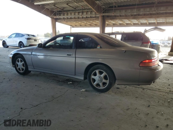 ✅ 1997 Lexus SC 300 • VIN: JT8CD32Z1V0039913 • Lot: 80564065. Wystawiony na Copart z przebiegiem 209 672 mil. Bezpłatny archiwum sprzedaży aukcyjnych z USA i szczegółowy raport historii pojazdu na DreamBid. Zdjęcie 2.
