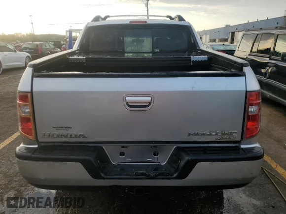 ✅ 2010 Honda Ridgeline RTL • VIN: 5FPYK1F57AB013019 • Lot: 73339724. Wystawiony na Copart z przebiegiem 246 366 mil. Bezpłatny archiwum sprzedaży aukcyjnych z USA i szczegółowy raport historii pojazdu na DreamBid. Zdjęcie 6.