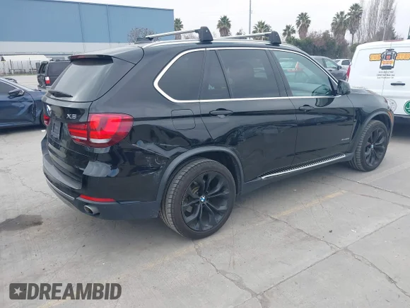 ✅ 2015 BMW X5 xDrive35d • VIN: 5UXKS4C5XF0N08971 • Lot: 44227277. Listed on IAAI with 99,399 mi. Free auction sales archive from the USA and detailed vehicle history report at DreamBid. Image 4.