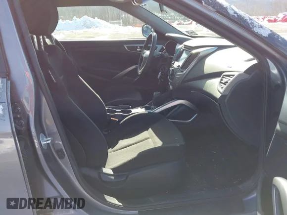 ✅ 2015 Hyundai Veloster • VIN: KMHTC6AD0FU237139 • Lot: 44450910. Listed on IAAI with 102,925 mi. Free auction sales archive from the USA and detailed vehicle history report at DreamBid. Image 5.