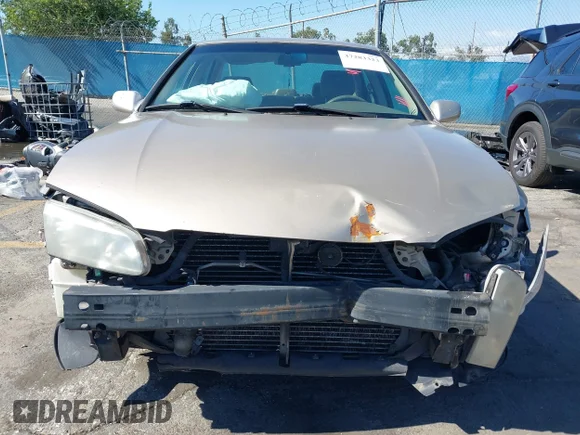 ✅ 2000 Toyota Camry LE • VIN: JT2BF22K2Y0282406 • Лот: 37283323. Опубликован ранее на IAAI с пробегом 223 759 миль. Бесплатный доступ к архиву аукционных продаж из США и подробный отчёт об истории автомобиля на DreamBid. Изображение 6.