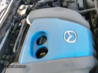 ✅ 2012 Mazda 3 i Touring • VIN: JM1BL1L76C1665708 • Lot: 42776311. Listed on IAAI with 112,446 mi. Free auction sales archive from the USA and detailed vehicle history report at DreamBid. Image 13.