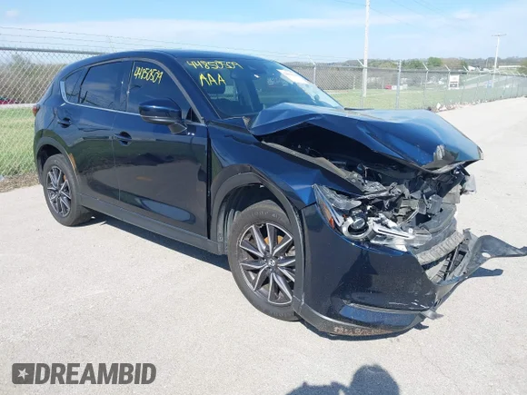 ✅ 2018 Mazda CX-5 Grand Touring • VIN: JM3KFADM0J1385606 • Lot: 44850509. Wystawiony na IAAI z przebiegiem 103 634 mil. Bezpłatny archiwum sprzedaży aukcyjnych z USA i szczegółowy raport historii pojazdu na DreamBid. Zdjęcie 1.