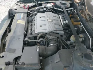 ✅ 1999 Cadillac DeVille • VIN: 1G6KF5498XU761779 • Lot: 41872157. Listed on IAAI with 107,639 mi. Free auction sales archive from the USA and detailed vehicle history report at DreamBid. Image 12.