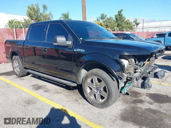 ✅ 2015 Ford F-150 XL • VIN: 1FTEW1CF8FKD36874 • Lot: 43469039. Listed on IAAI with 153,011 mi. Free auction sales archive from the USA and detailed vehicle history report at DreamBid. Image 1.