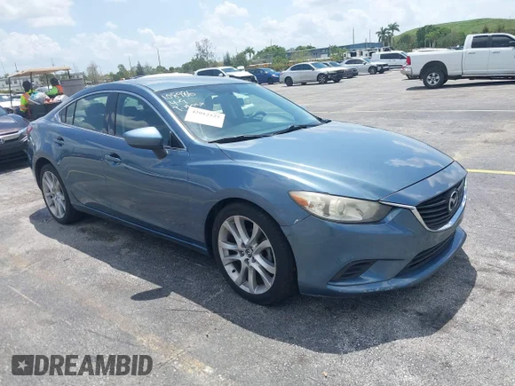 ✅ 2014 Mazda 6 i Touring • VIN: JM1GJ1V58E1108986 • Лот: 42012525. Опубліковано раніше на IAAI з пробігом 152 048 миль. Безкоштовний доступ до архіву аукціонних продажів зі США та докладний звіт про історію автомобіля на DreamBid. Зображення 1.