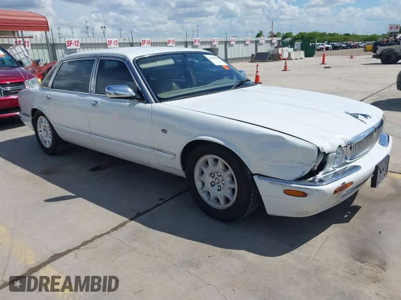 ✅ 1998 Jaguar XJ Vanden Plas • VIN: SAJKX6244WC842758 • Lot: 42591587. Listed on IAAI with 206,724 mi. Free auction sales archive from the USA and detailed vehicle history report at DreamBid. Image 1.