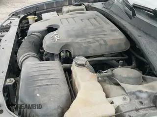 ✅ 2013 Dodge Charger SXT • VIN: 2C3CDXJGXDH735337 • Lot: 43551833. Listed on IAAI with 246,530 mi. Free auction sales archive from the USA and detailed vehicle history report at DreamBid. Image 19.