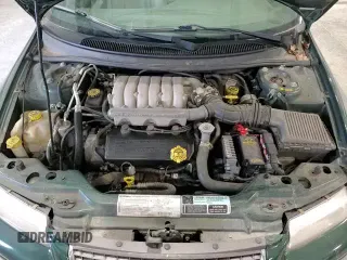 ✅ 1999 Chrysler Cirrus LXi • VIN: 1C3EJ56H6XN600228 • Лот: 86002314. Опубликован ранее на Copart с пробегом 42 402 миль. Бесплатный доступ к архиву аукционных продаж из США и подробный отчёт об истории автомобиля на DreamBid. Изображение 13.