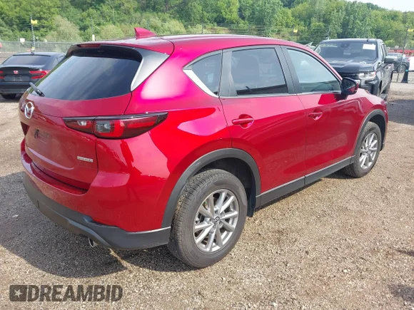 ✅ 2023 Mazda CX-5 S Carbon Edition • VIN: JM3KFBCM8P0140980 • Lot: 45317664. Wystawiony na IAAI z przebiegiem 105 527 mil. Bezpłatny archiwum sprzedaży aukcyjnych z USA i szczegółowy raport historii pojazdu na DreamBid. Zdjęcie 4.