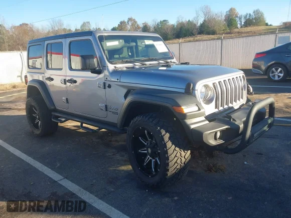 ✅ 2018 Jeep Wrangler Unlimited Sport • VIN: 1C4HJXDG4JW105381 • Lot: 43796917. Wystawiony na IAAI z przebiegiem 50 495 mil. Bezpłatny archiwum sprzedaży aukcyjnych z USA i szczegółowy raport historii pojazdu na DreamBid. Zdjęcie 1.