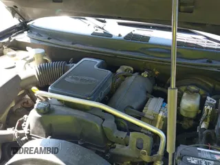 ✅ 2005 GMC Envoy SLE • VIN: 1GKDS13S452208252 • Lot: 42357457. Listed on IAAI with 197,419 mi. Free auction sales archive from the USA and detailed vehicle history report at DreamBid. Image 19.