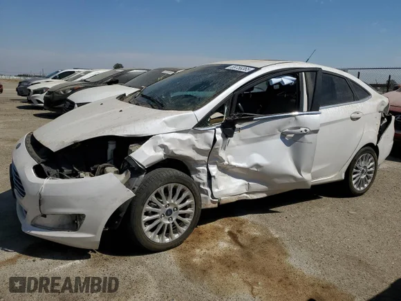 ✅ 2016 Ford Fiesta Titanium • VIN: 3FADP4CJ8GM139332 • Лот: 69756365. Опубліковано раніше на Copart з пробігом 160 554 миль. Безкоштовний доступ до архіву аукціонних продажів зі США та докладний звіт про історію автомобіля на DreamBid. Зображення 1.