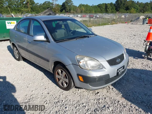 ✅ 2009 Kia Rio • VIN: KNADE223896475814 • Lot: 43238002. Wystawiony na IAAI z przebiegiem 134 700 mil. Bezpłatny archiwum sprzedaży aukcyjnych z USA i szczegółowy raport historii pojazdu na DreamBid. Zdjęcie 1.