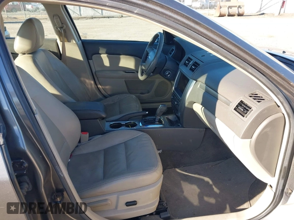 ✅ 2010 Ford Fusion Hybrid • VIN: 3FADP0L3XAR143399 • Lot: 44046015. Wystawiony na IAAI z przebiegiem 187 496 mil. Bezpłatny archiwum sprzedaży aukcyjnych z USA i szczegółowy raport historii pojazdu na DreamBid. Zdjęcie 5.