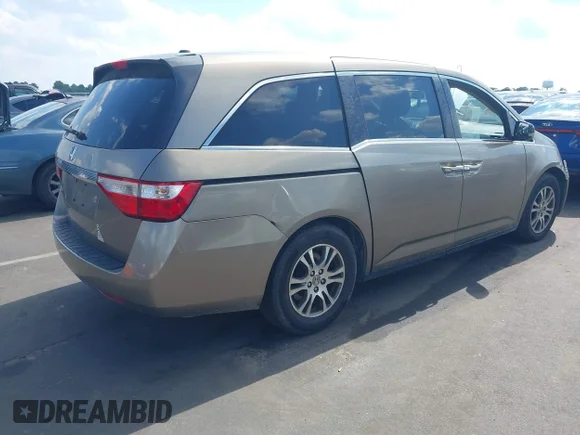 ✅ 2013 Honda Odyssey EX-L • VIN: 5FNRL5H64DB064263 • Лот: 45390503. Опубліковано раніше на IAAI з пробігом 255 206 миль. Безкоштовний доступ до архіву аукціонних продажів зі США та докладний звіт про історію автомобіля на DreamBid. Зображення 4.
