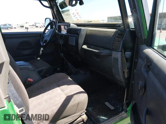 ✅ 2005 Jeep Wrangler Rubicon • VIN: 1J4FA64SX5P327214 • Lot: 44984373. Wystawiony na IAAI z przebiegiem 115 452 mil. Bezpłatny archiwum sprzedaży aukcyjnych z USA i szczegółowy raport historii pojazdu na DreamBid. Zdjęcie 5.
