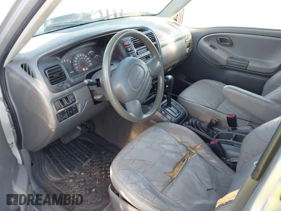 ✅ 2002 Chevrolet Tracker LT • VIN: 2CNBJ634126938635 • Lot: 43402527. Wystawiony na IAAI z przebiegiem 150 483 mil. Bezpłatny archiwum sprzedaży aukcyjnych z USA i szczegółowy raport historii pojazdu na DreamBid. Zdjęcie 5.