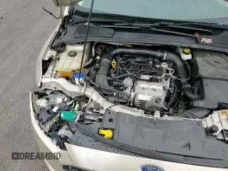 ✅ 2017 Ford Focus SE • VIN: 1FADP3FE1HL283042 • Лот: 90777065. Опубликован ранее на Copart с пробегом 76 323 миль. Бесплатный доступ к архиву аукционных продаж из США и подробный отчёт об истории автомобиля на DreamBid. Изображение 16.