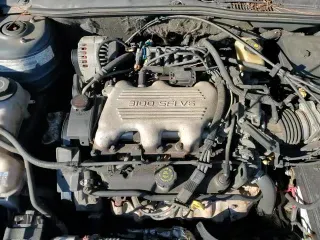 1998 Chevrolet Malibu LS z VIN 1G1NE52M0W6167882, wystawiony jako Copart lot #45082955 z przebiegiem 164 622 mil mil oraz Szkoda całkowita • Salvage title. Historia ofert i sprzedaży dostępna na DreamBid. Obrazek 14.