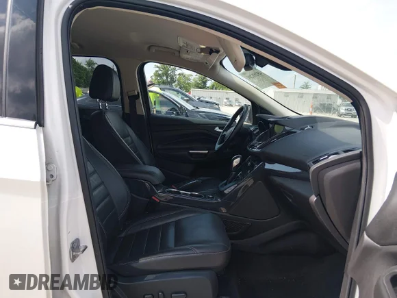 ✅ 2015 Ford Escape Titanium • VIN: 1FMCU0JX6FUB79851 • Lot: 45258201. Wystawiony na IAAI z przebiegiem 178 913 mil. Bezpłatny archiwum sprzedaży aukcyjnych z USA i szczegółowy raport historii pojazdu na DreamBid. Zdjęcie 5.