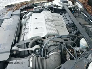 ✅ 1997 Cadillac Eldorado Touring • VIN: 1G6ET1293VU604921 • Lot: 42113040. Wystawiony na IAAI z przebiegiem 57 029 mil. Bezpłatny archiwum sprzedaży aukcyjnych z USA i szczegółowy raport historii pojazdu na DreamBid. Zdjęcie 12.