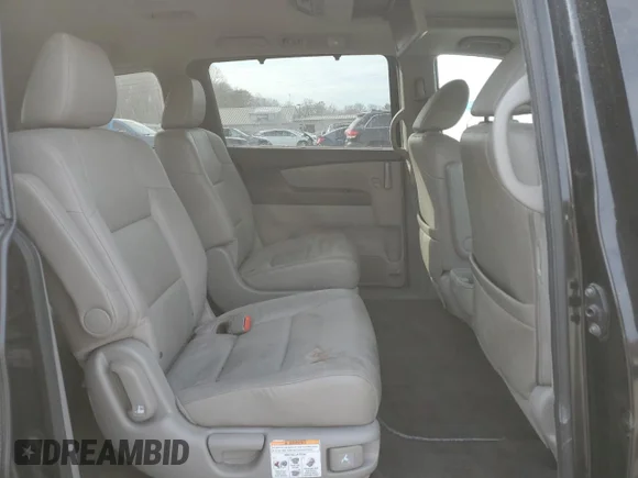 ✅ 2013 Honda Odyssey Touring • VIN: 5FNRL5H91DB086036 • Lot: 80735604. Wystawiony na Copart z przebiegiem 145 830 mil. Bezpłatny archiwum sprzedaży aukcyjnych z USA i szczegółowy raport historii pojazdu na DreamBid. Zdjęcie 11.