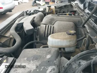 ✅ 2005 GMC Yukon XL • VIN: 1GKFK66U05J100042 • Lot: 42175231. Listed on IAAI with 312,911 mi. Free auction sales archive from the USA and detailed vehicle history report at DreamBid. Image 19.