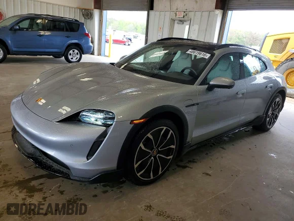 ✅ 2022 Porsche Taycan 4 • VIN: WP0BA2Y18NSA67149 • Лот: 48619616. Опубликован ранее на Copart с пробегом 10 047 миль. Бесплатный доступ к архиву аукционных продаж из США и подробный отчёт об истории автомобиля на DreamBid. Изображение 1.