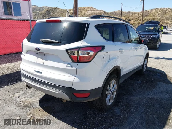 ✅ 2018 Ford Escape SE • VIN: 1FMCU9GD5JUD08575 • Лот: 45235427. Опубликован ранее на IAAI с пробегом 47 299 миль. Бесплатный доступ к архиву аукционных продаж из США и подробный отчёт об истории автомобиля на DreamBid. Изображение 4.