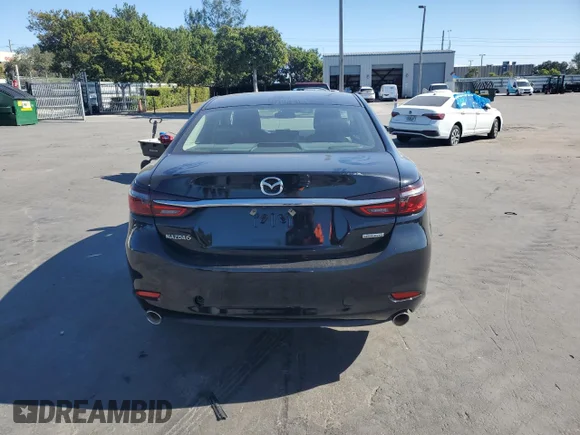 ✅ 2021 Mazda 6 Touring • VIN: JM1GL1VM7M1614986 • Лот: 83183424. Опубліковано раніше на Copart з пробігом 38 168 миль. Безкоштовний доступ до архіву аукціонних продажів зі США та докладний звіт про історію автомобіля на DreamBid. Зображення 6.
