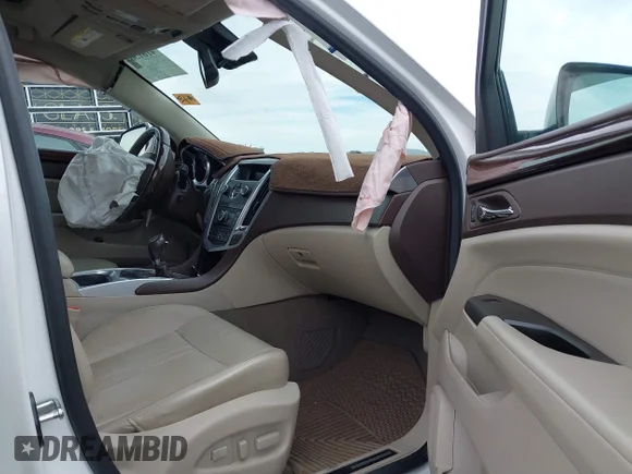 ✅ 2012 Cadillac SRX Luxury Collection • VIN: 3GYFNAE34CS606963 • Lot: 41815097. Wystawiony na IAAI z przebiegiem Nie podano. Bezpłatny archiwum sprzedaży aukcyjnych z USA i szczegółowy raport historii pojazdu na DreamBid. Zdjęcie 5.