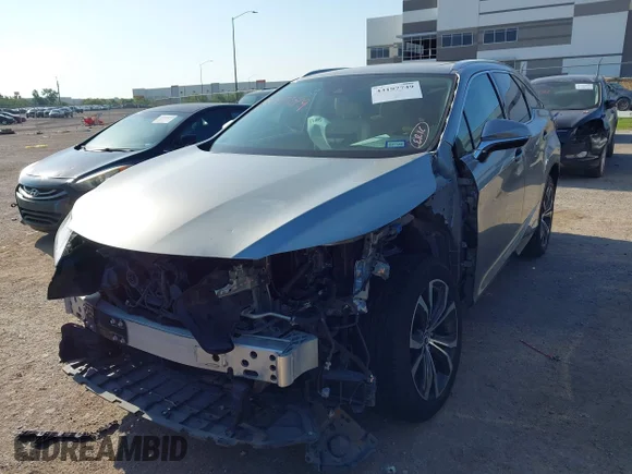 ✅ 2020 Lexus RX 450hL • VIN: JTJHGKFA1L2015087 • Лот: 43197749. Опубліковано раніше на IAAI з пробігом 70 052 миль. Безкоштовний доступ до архіву аукціонних продажів зі США та докладний звіт про історію автомобіля на DreamBid. Зображення 2.