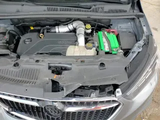 ✅ 2019 Buick Encore Essence • VIN: KL4CJCSM8KB919600 • Lot: 87382355. Listed on Copart with 28,176 mi. Free auction sales archive from the USA and detailed vehicle history report at DreamBid. Image 16.