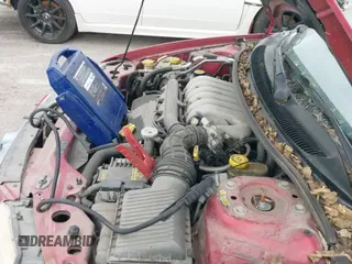 ✅ 1998 Chrysler Sebring JXi • VIN: 3C3EL55H8WT338996 • Lot: 43393947. Listed on IAAI with 93,165 mi. Free auction sales archive from the USA and detailed vehicle history report at DreamBid. Image 16.