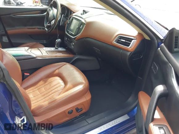 ✅ 2015 Maserati Ghibli • VIN: ZAM57XSA0F1145179 • Лот: 43375887. Опубліковано раніше на IAAI з пробігом 113 858 миль. Безкоштовний доступ до архіву аукціонних продажів зі США та докладний звіт про історію автомобіля на DreamBid. Зображення 5.